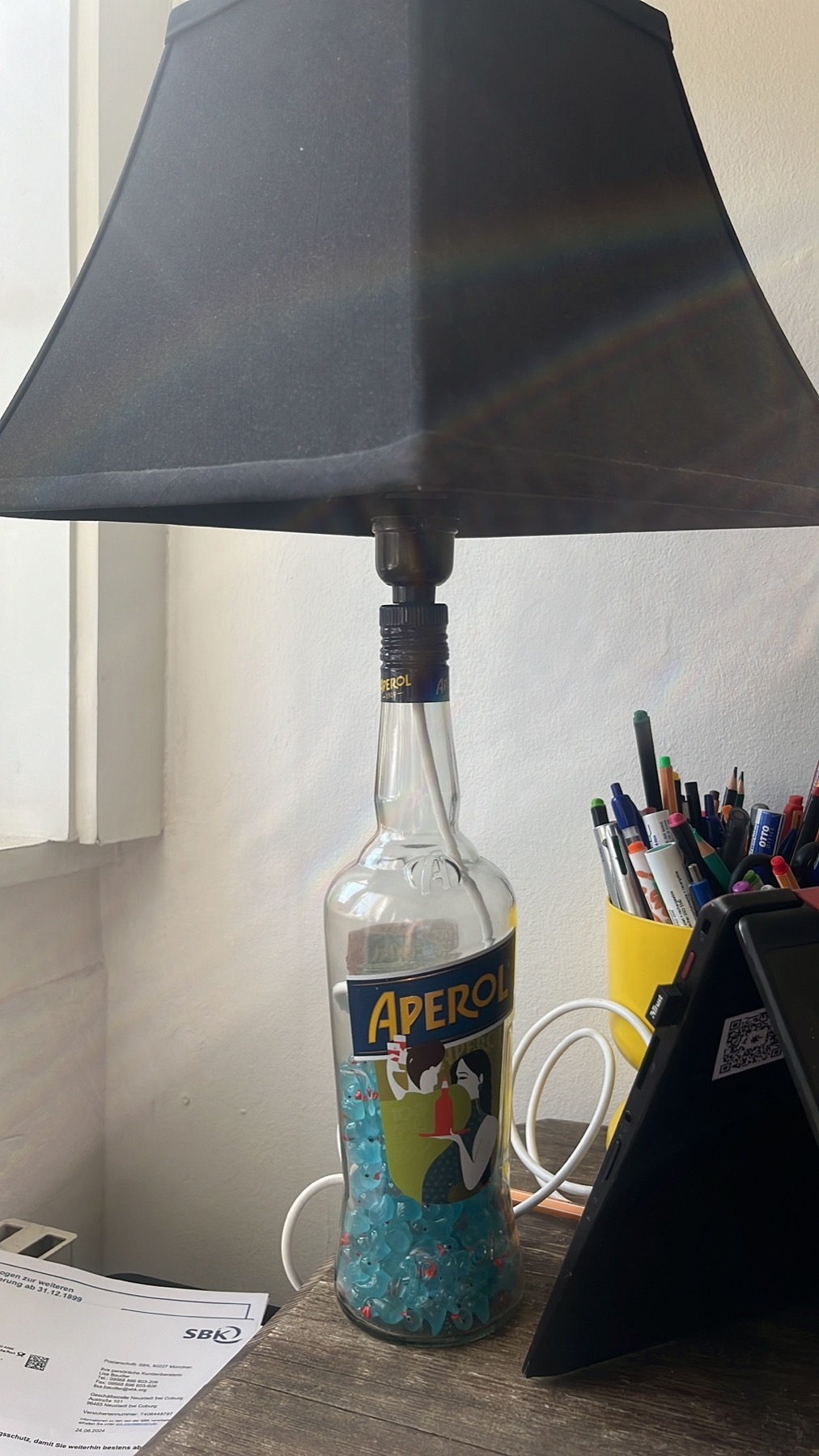Aperol-Flasche als Lampe